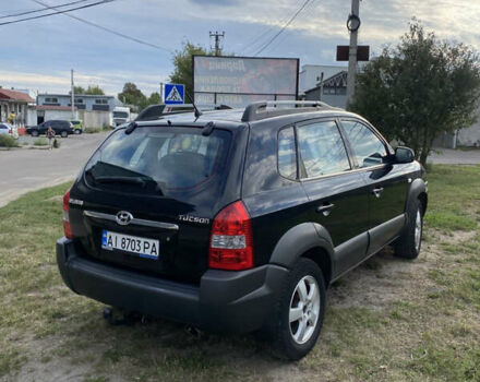 Чорний Хендай Туксон, об'ємом двигуна 2 л та пробігом 231 тис. км за 8200 $, фото 2 на Automoto.ua