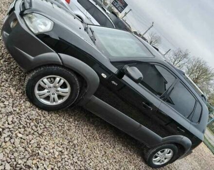 Чорний Хендай Туксон, об'ємом двигуна 2 л та пробігом 185 тис. км за 7499 $, фото 24 на Automoto.ua