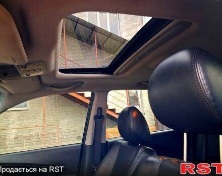 Чорний Хендай Туксон, об'ємом двигуна 2 л та пробігом 208 тис. км за 7500 $, фото 3 на Automoto.ua