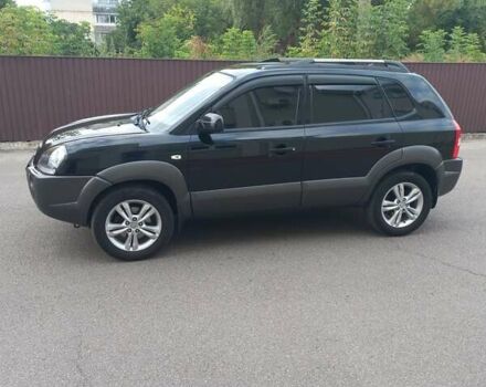 Черный Хендай Туксон, объемом двигателя 2 л и пробегом 168 тыс. км за 9000 $, фото 12 на Automoto.ua