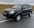 Черный Хендай Туксон, объемом двигателя 2 л и пробегом 253 тыс. км за 8299 $, фото 1 на Automoto.ua