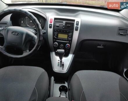 Черный Хендай Туксон, объемом двигателя 2 л и пробегом 237 тыс. км за 7500 $, фото 15 на Automoto.ua