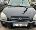 Чорний Хендай Туксон, об'ємом двигуна 2 л та пробігом 260 тис. км за 7700 $, фото 1 на Automoto.ua