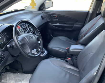 Черный Хендай Туксон, объемом двигателя 2 л и пробегом 220 тыс. км за 8700 $, фото 21 на Automoto.ua
