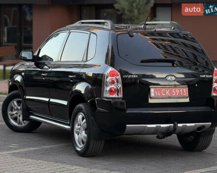 Чорний Хендай Туксон, об'ємом двигуна 2 л та пробігом 156 тис. км за 7850 $, фото 19 на Automoto.ua