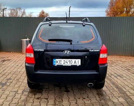 Черный Хендай Туксон, объемом двигателя 2 л и пробегом 223 тыс. км за 7500 $, фото 11 на Automoto.ua