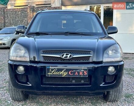 Черный Хендай Туксон, объемом двигателя 2 л и пробегом 230 тыс. км за 7500 $, фото 1 на Automoto.ua