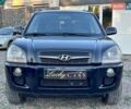 Черный Хендай Туксон, объемом двигателя 2 л и пробегом 230 тыс. км за 7500 $, фото 1 на Automoto.ua