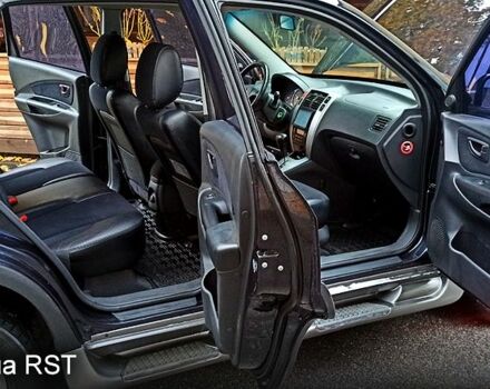 Чорний Хендай Туксон, об'ємом двигуна 2 л та пробігом 188 тис. км за 8800 $, фото 7 на Automoto.ua