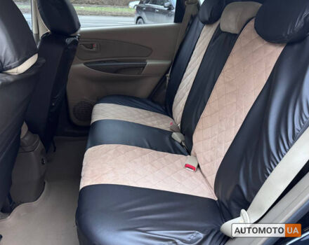 Черный Хендай Туксон, объемом двигателя 2 л и пробегом 170 тыс. км за 9200 $, фото 13 на Automoto.ua