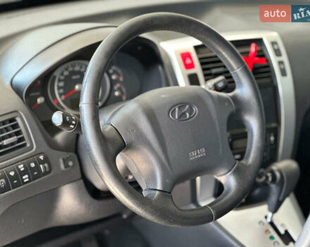 Черный Хендай Туксон, объемом двигателя 2.7 л и пробегом 158 тыс. км за 7940 $, фото 17 на Automoto.ua