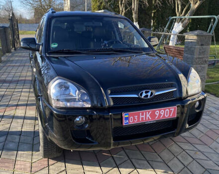 Черный Хендай Туксон, объемом двигателя 2 л и пробегом 149 тыс. км за 8250 $, фото 1 на Automoto.ua