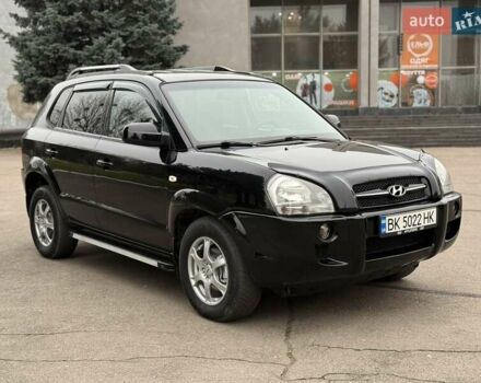 Черный Хендай Туксон, объемом двигателя 1.99 л и пробегом 240 тыс. км за 7200 $, фото 11 на Automoto.ua