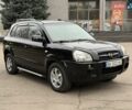Черный Хендай Туксон, объемом двигателя 1.99 л и пробегом 240 тыс. км за 7200 $, фото 11 на Automoto.ua