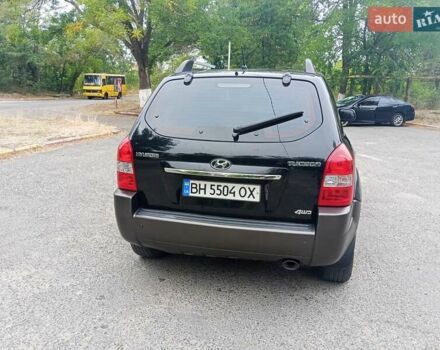 Черный Хендай Туксон, объемом двигателя 1.98 л и пробегом 157 тыс. км за 7500 $, фото 7 на Automoto.ua