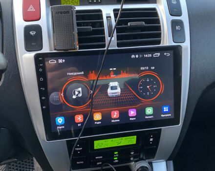 Черный Хендай Туксон, объемом двигателя 1.98 л и пробегом 254 тыс. км за 7700 $, фото 20 на Automoto.ua