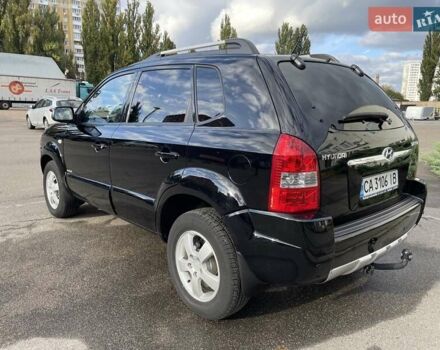 Черный Хендай Туксон, объемом двигателя 1.98 л и пробегом 172 тыс. км за 8500 $, фото 20 на Automoto.ua