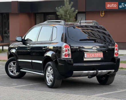 Чорний Хендай Туксон, об'ємом двигуна 2 л та пробігом 156 тис. км за 7850 $, фото 21 на Automoto.ua