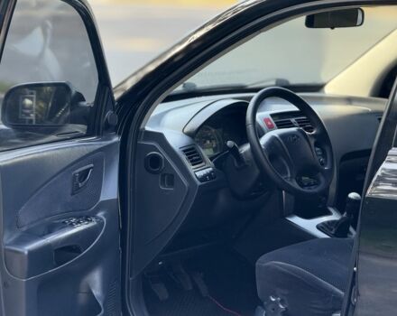 Чорний Хендай Туксон, об'ємом двигуна 2 л та пробігом 207 тис. км за 7600 $, фото 10 на Automoto.ua