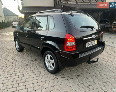 Черный Хендай Туксон, объемом двигателя 2 л и пробегом 276 тыс. км за 7450 $, фото 14 на Automoto.ua