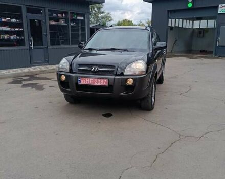 Черный Хендай Туксон, объемом двигателя 2 л и пробегом 255 тыс. км за 8700 $, фото 1 на Automoto.ua