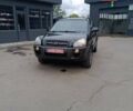 Черный Хендай Туксон, объемом двигателя 2 л и пробегом 255 тыс. км за 8700 $, фото 1 на Automoto.ua