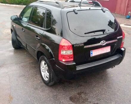 Чорний Хендай Туксон, об'ємом двигуна 2 л та пробігом 225 тис. км за 7850 $, фото 8 на Automoto.ua