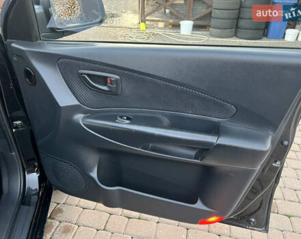 Черный Хендай Туксон, объемом двигателя 2 л и пробегом 276 тыс. км за 7450 $, фото 33 на Automoto.ua