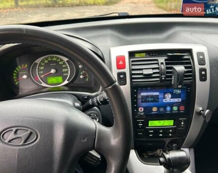 Хендай Туксон 2008 в Богодухове на Automoto.ua Черный Хендай Туксон, объемом двигателя 1.98 л и пробегом 268 тыс. км за 8500 $, фото 8 на Automoto.ua