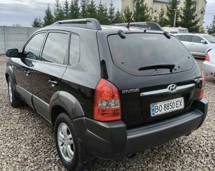 Чорний Хендай Туксон, об'ємом двигуна 2 л та пробігом 185 тис. км за 7499 $, фото 21 на Automoto.ua