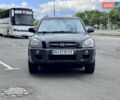 Черный Хендай Туксон, объемом двигателя 2.66 л и пробегом 142 тыс. км за 8200 $, фото 1 на Automoto.ua