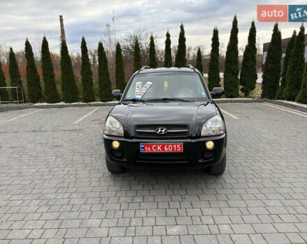 Черный Хендай Туксон, объемом двигателя 1.98 л и пробегом 205 тыс. км за 7950 $, фото 8 на Automoto.ua