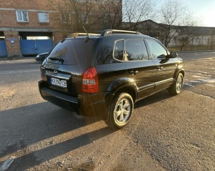 Черный Хендай Туксон, объемом двигателя 2 л и пробегом 205 тыс. км за 8400 $, фото 2 на Automoto.ua