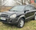 Черный Хендай Туксон, объемом двигателя 2 л и пробегом 148 тыс. км за 9500 $, фото 1 на Automoto.ua