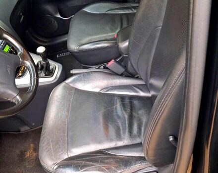 Чорний Хендай Туксон, об'ємом двигуна 2 л та пробігом 208 тис. км за 7500 $, фото 4 на Automoto.ua