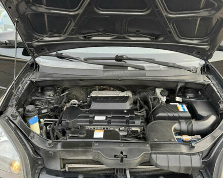 Черный Хендай Туксон, объемом двигателя 2 л и пробегом 210 тыс. км за 7850 $, фото 39 на Automoto.ua