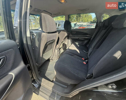 Черный Хендай Туксон, объемом двигателя 2 л и пробегом 218 тыс. км за 6700 $, фото 9 на Automoto.ua