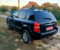 Черный Хендай Туксон, объемом двигателя 2 л и пробегом 175 тыс. км за 8300 $, фото 1 на Automoto.ua