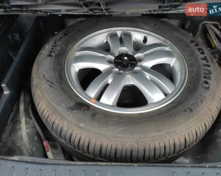 Черный Хендай Туксон, объемом двигателя 2 л и пробегом 237 тыс. км за 7500 $, фото 9 на Automoto.ua