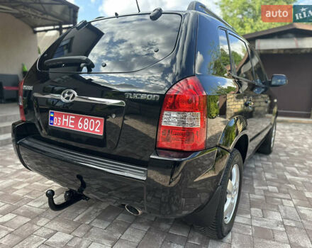 Черный Хендай Туксон, объемом двигателя 2 л и пробегом 218 тыс. км за 8700 $, фото 14 на Automoto.ua