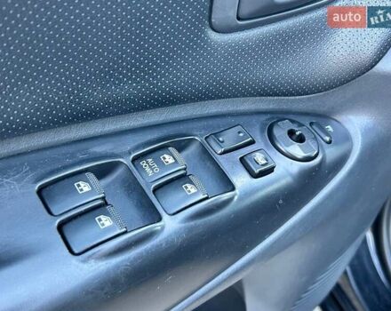 Черный Хендай Туксон, объемом двигателя 2 л и пробегом 230 тыс. км за 7500 $, фото 11 на Automoto.ua