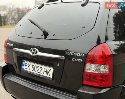 Черный Хендай Туксон, объемом двигателя 1.99 л и пробегом 240 тыс. км за 7200 $, фото 22 на Automoto.ua