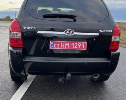 Черный Хендай Туксон, объемом двигателя 2 л и пробегом 253 тыс. км за 8299 $, фото 16 на Automoto.ua