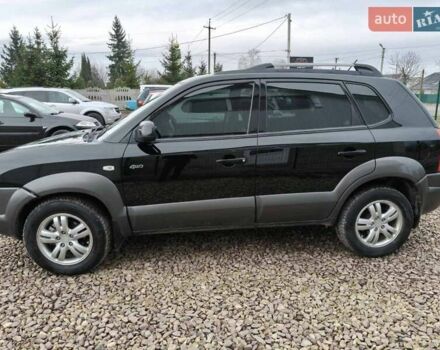 Чорний Хендай Туксон, об'ємом двигуна 2 л та пробігом 185 тис. км за 7499 $, фото 9 на Automoto.ua