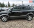 Чорний Хендай Туксон, об'ємом двигуна 2 л та пробігом 185 тис. км за 7499 $, фото 9 на Automoto.ua