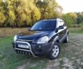 Черный Хендай Туксон, объемом двигателя 2 л и пробегом 162 тыс. км за 8500 $, фото 1 на Automoto.ua