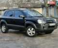 Чорний Хендай Туксон, об'ємом двигуна 2 л та пробігом 240 тис. км за 8500 $, фото 3 на Automoto.ua