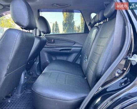 Черный Хендай Туксон, объемом двигателя 2 л и пробегом 230 тыс. км за 7500 $, фото 26 на Automoto.ua