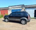 Черный Хендай Туксон, объемом двигателя 2 л и пробегом 190 тыс. км за 7900 $, фото 2 на Automoto.ua