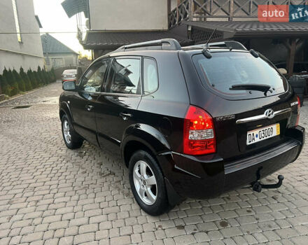 Черный Хендай Туксон, объемом двигателя 2 л и пробегом 276 тыс. км за 7450 $, фото 13 на Automoto.ua